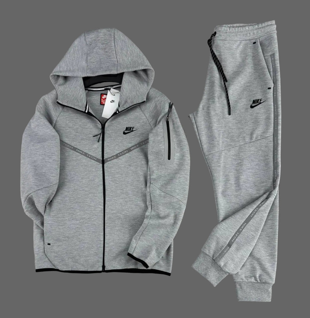 Nike Tech Fleece férfi melegítő, klasszikus szürke, fényvisszaverő csíkokkal és ujjzsebbel
