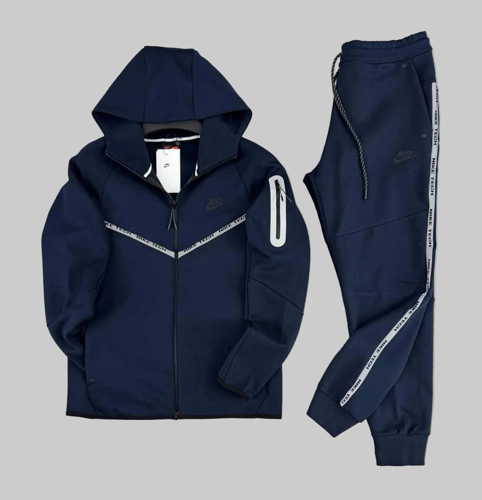 Nike Tech Fleece férfi melegítő, sötétkék, fényvisszaverő csíkokkal és ujjzsebbel