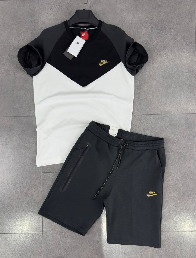 Férfi Nike Tech Fleece szett, fehér, fekete és grafitszürke pólóval és grafitszürke rövidnadrággal. Prémium minőség.